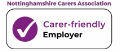 A tick in a purple circle and carer friendly employer text