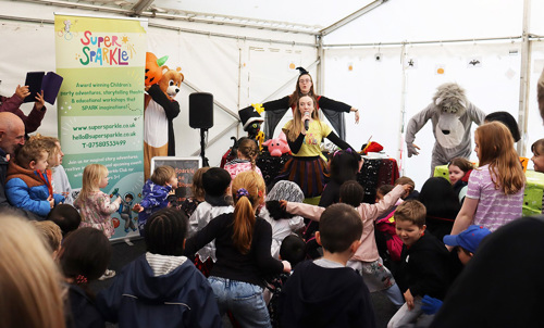 A children's Halloween themed singing and dancing show with a group of children